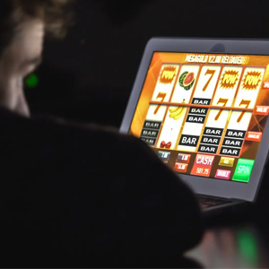 Man sat at gambling machine